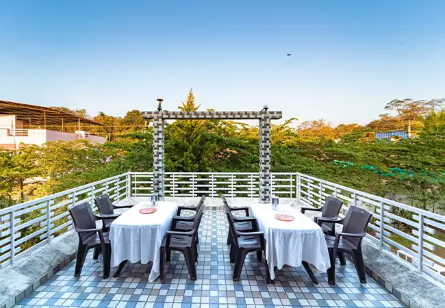 white petal homestay roof top dining